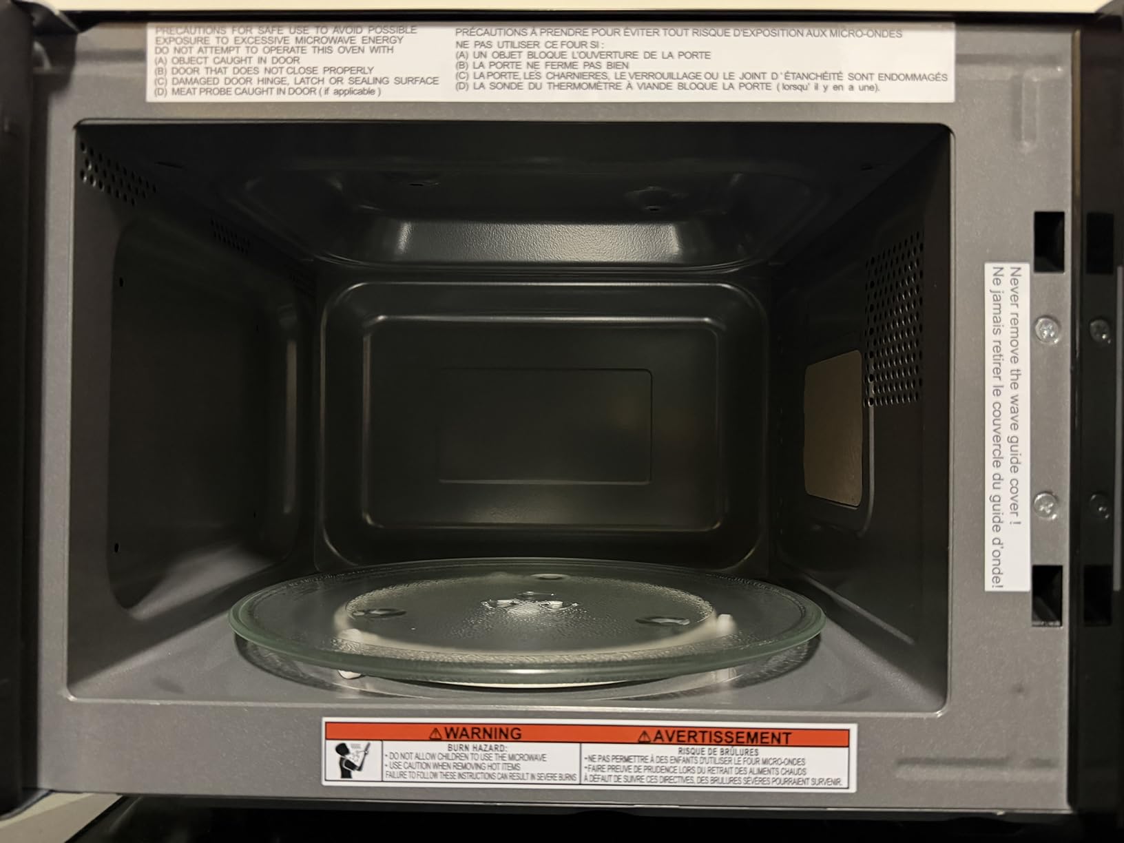 Farberware 0.7 Cu. Ft. Countertop Microwave Oven - 700 Watts Power, Auto Cook Settings, Defrost, Easy Clean and Child Safety Lock - Stainless customer photo 2