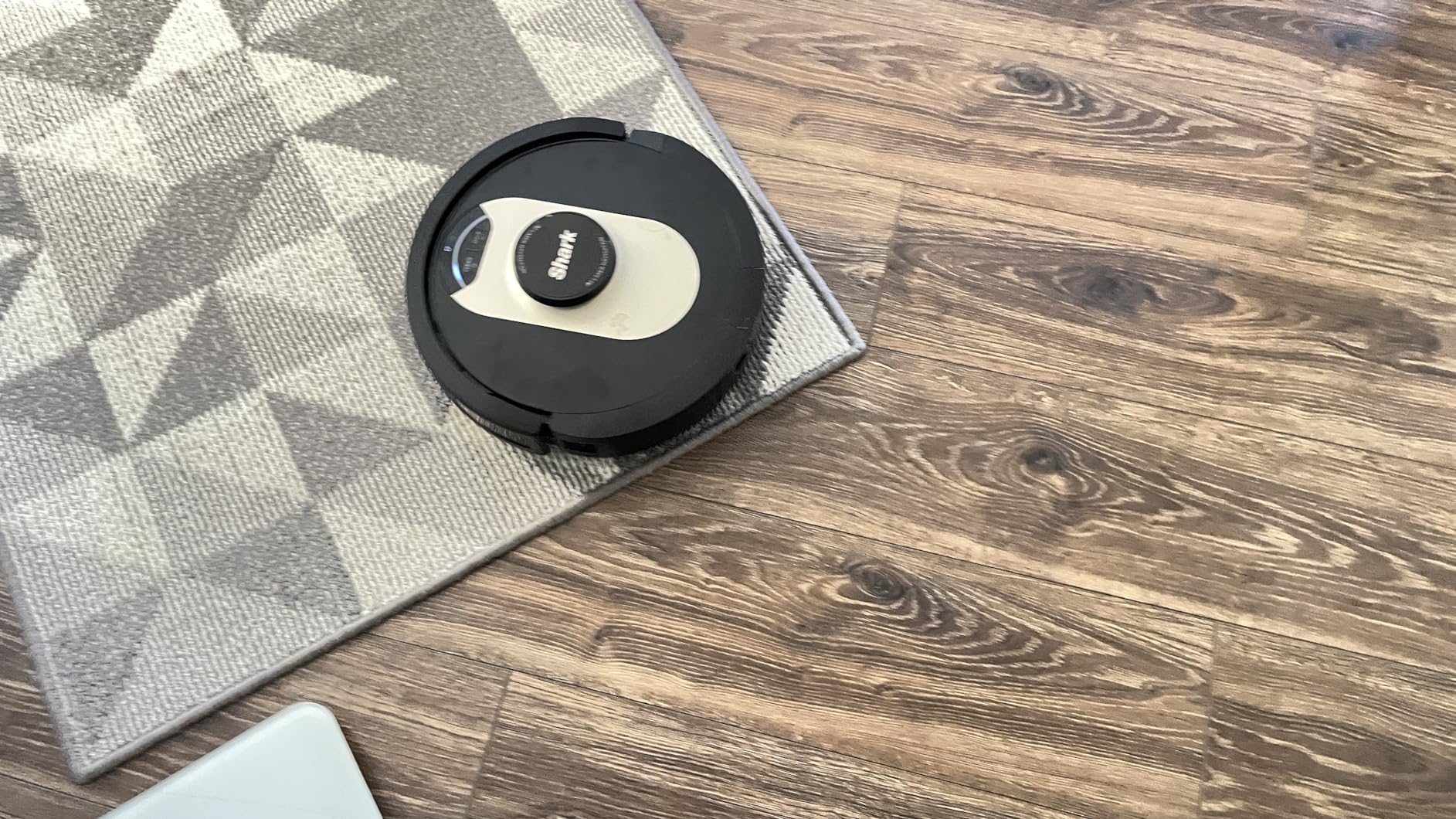 Shark AV752 ION Robot Vacuum, Tri-Brush System, Wifi Connected, 120 Min Runtime, Works with Alexa, Multi Surface Cleaning, White customer photo 1