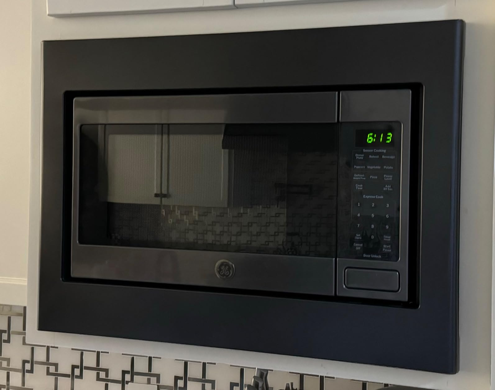 GE Countertop Microwave Oven, 1,150-watt Capacity, 1.6 Cubic Ft., 8 Auto Setting Cooking Settings, Child-Lock Technology, Kitchen Essentials for the Countertop, Dorm Room or Apartment, Stainless Steel customer photo 2