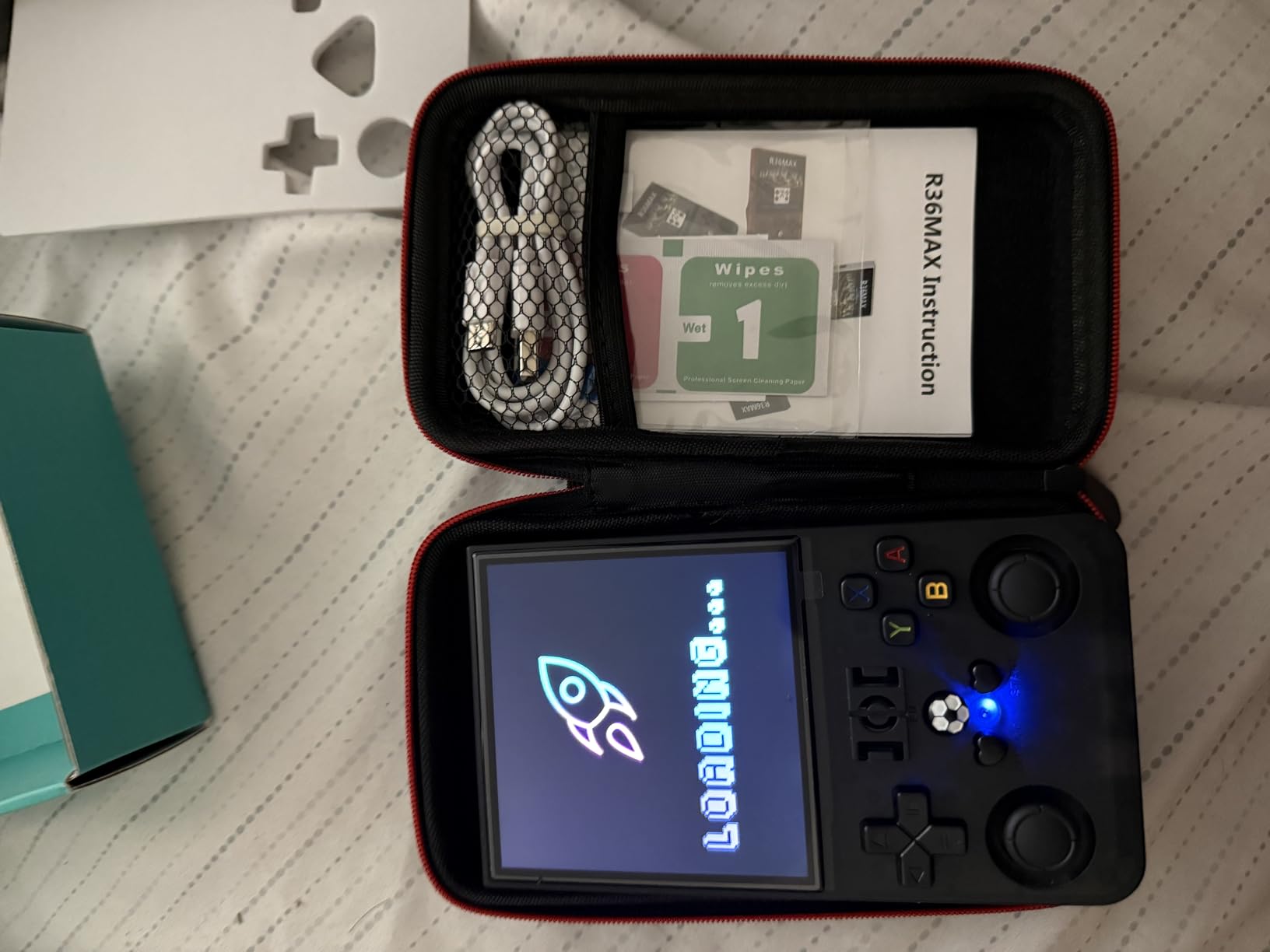 R36MAX Retro Handheld Game Console, Retro Gaming Console with 64G Built-in 18000+ Classic Games, 4.0 Inch 720x720 IPS Screen, Portable Handheld Linux System, 4000mAh Battery (Black) customer photo 1