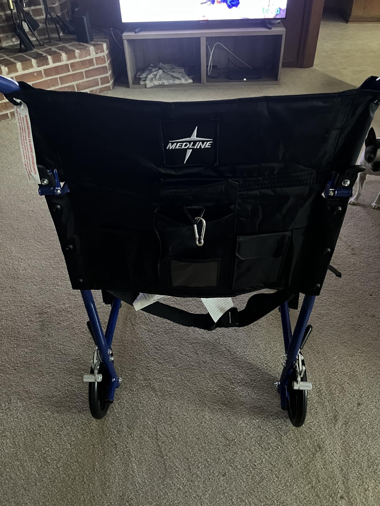 Medline Ultra Lightweight Transport Wheelchair for Adults, Foldable, 19-Inch Seat Width, Red Frame, Black Upholstery customer photo 1