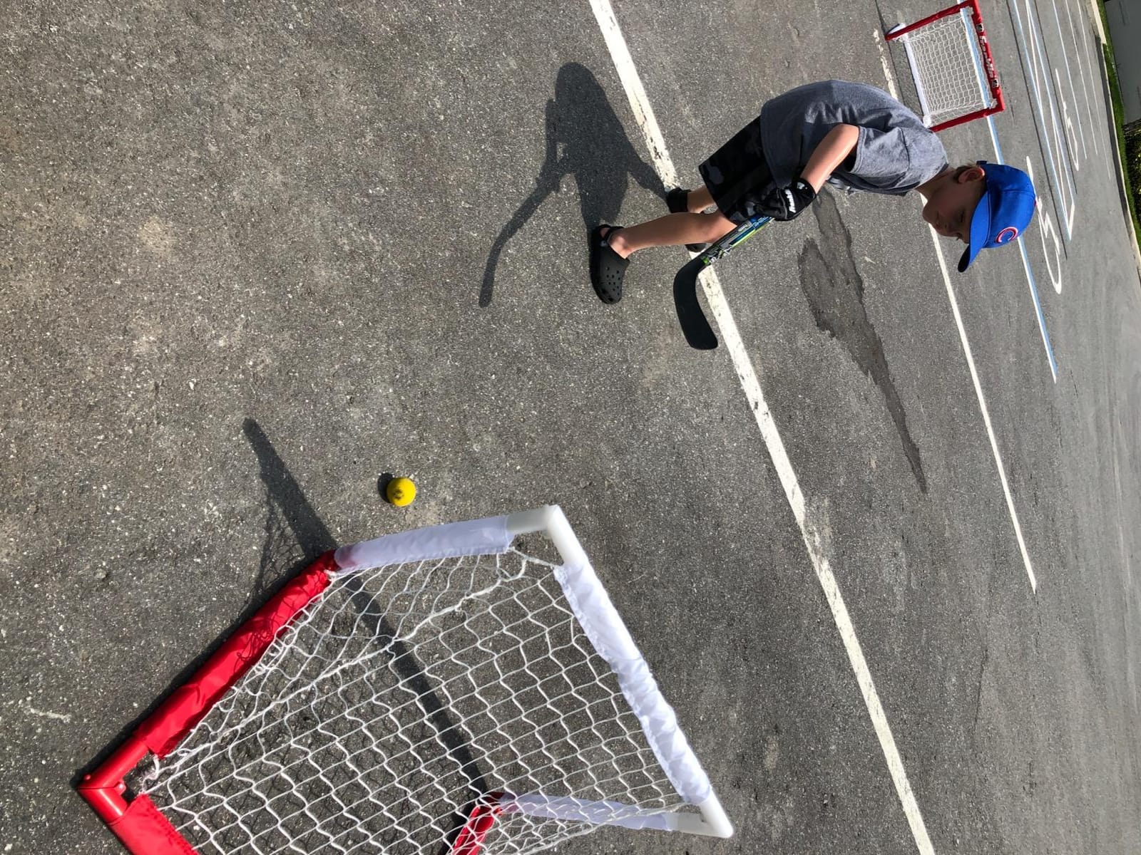 Franklin Sports - NHL Kids Folding Hockey Goals Set - (2) Street Hockey & Knee Hockey Goals - (2) Adjustable Youth Hockey Sticks, (2) Knee Hockey Sticks, (2) Mini Hockey Balls + (1) Street Hockey Ball customer photo 1