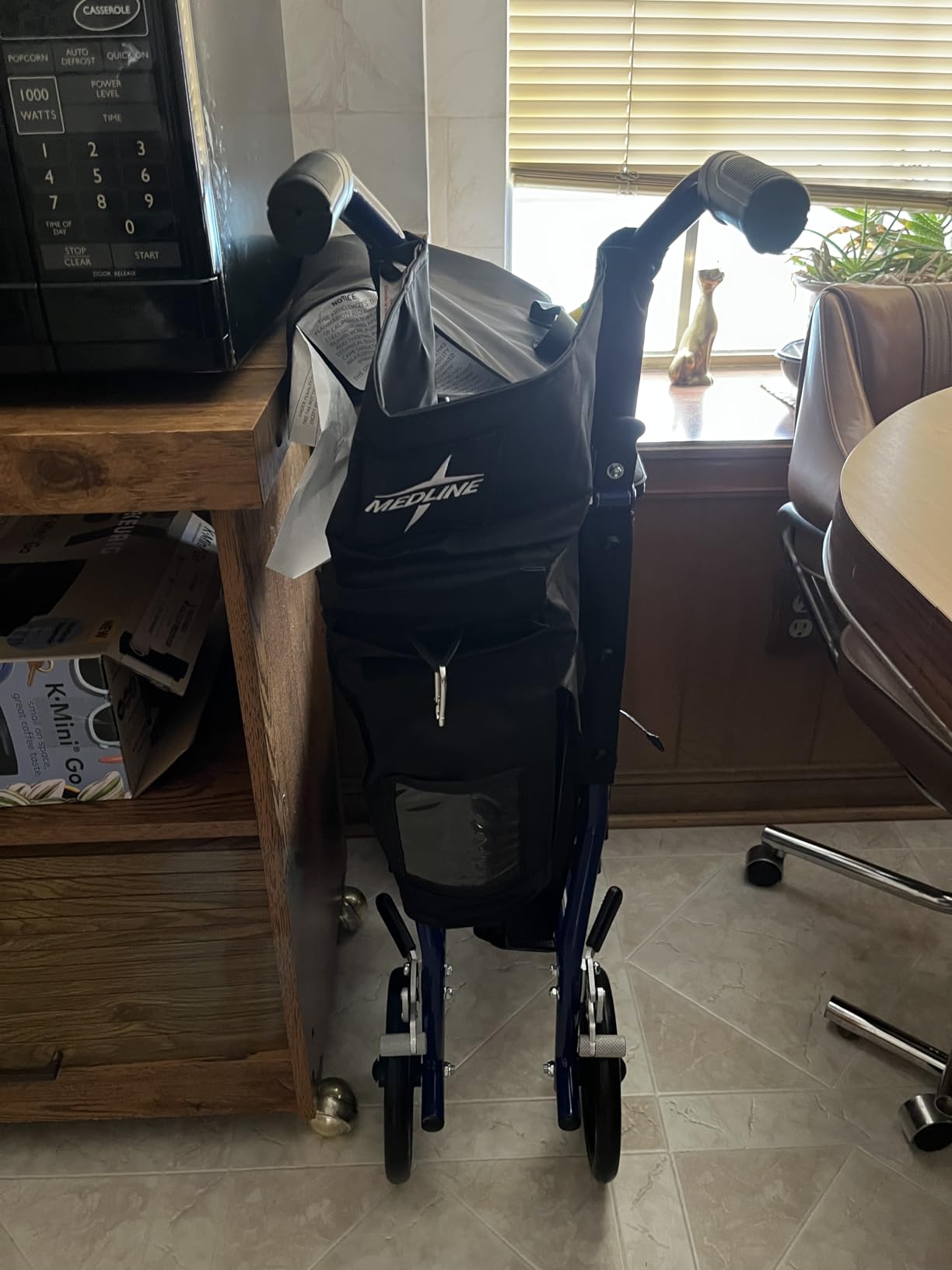 Medline Ultra Lightweight Transport Wheelchair for Adults, Foldable, 19-Inch Seat Width, Blue Frame, Black Upholstery customer photo 2