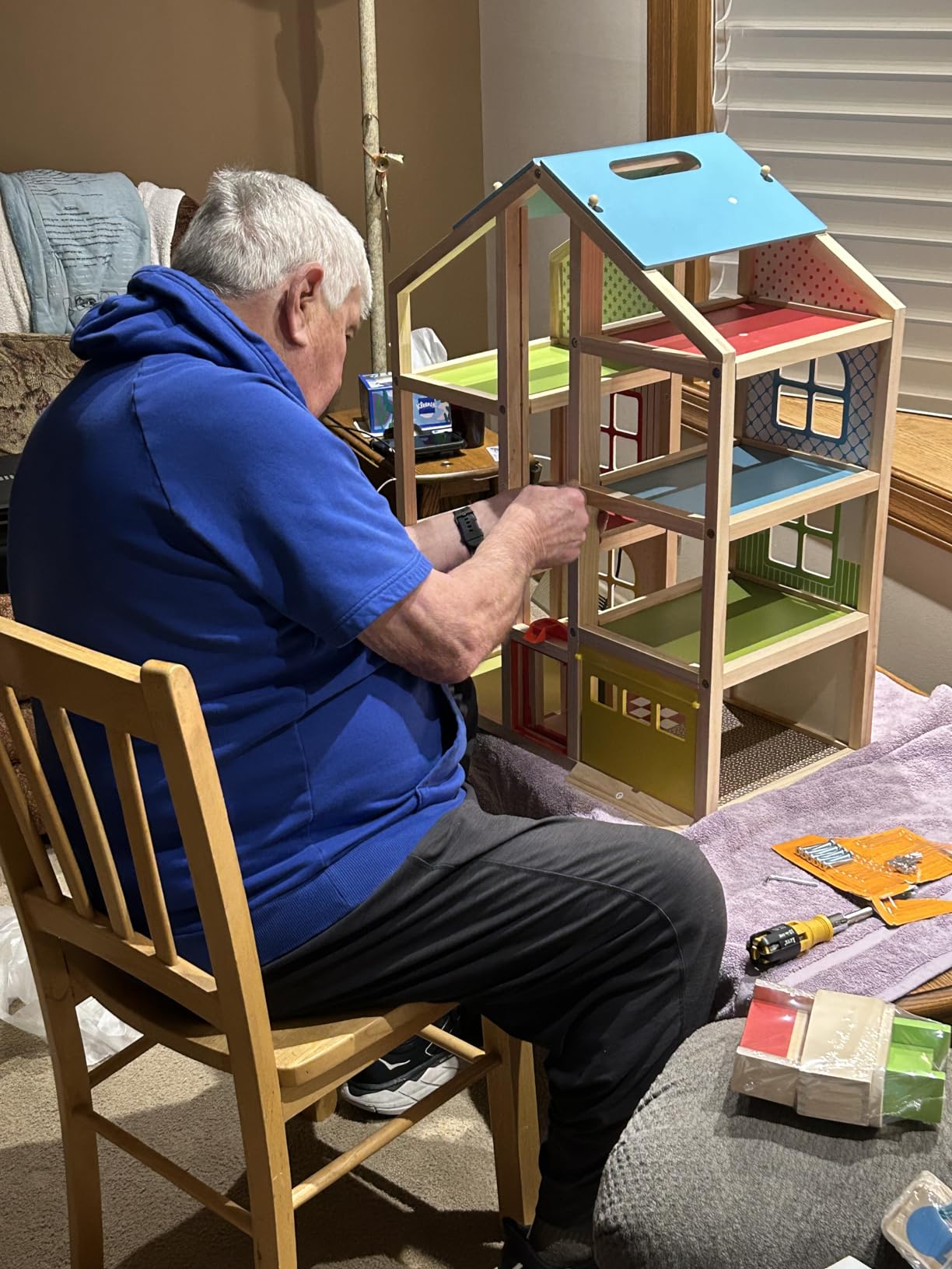 Melissa & Doug Wooden Hi-Rise Dollhouse with 15 Furniture Pieces, Garage, Working Elevator Preschool Dollhouse for Kids Ages 3+ customer photo 1