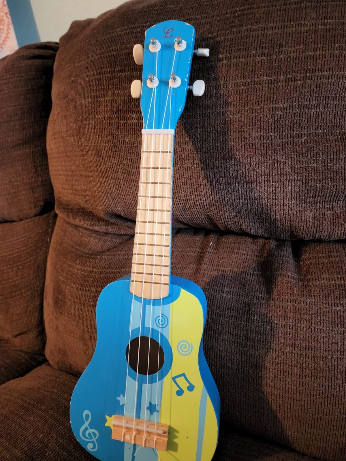 Hape Kid's Wooden Toy Ukulele, Red customer photo 1