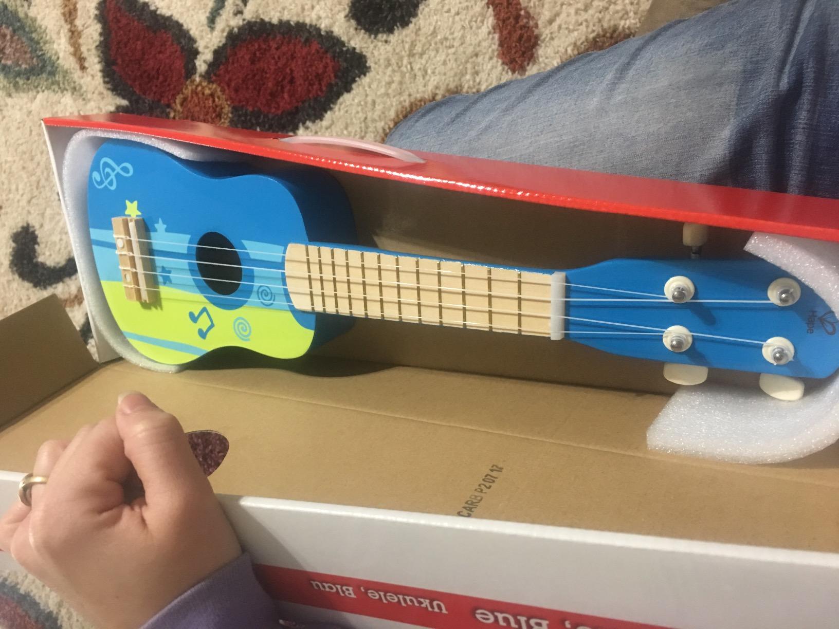 Hape Kid's Wooden Toy Ukulele, Red customer photo 2