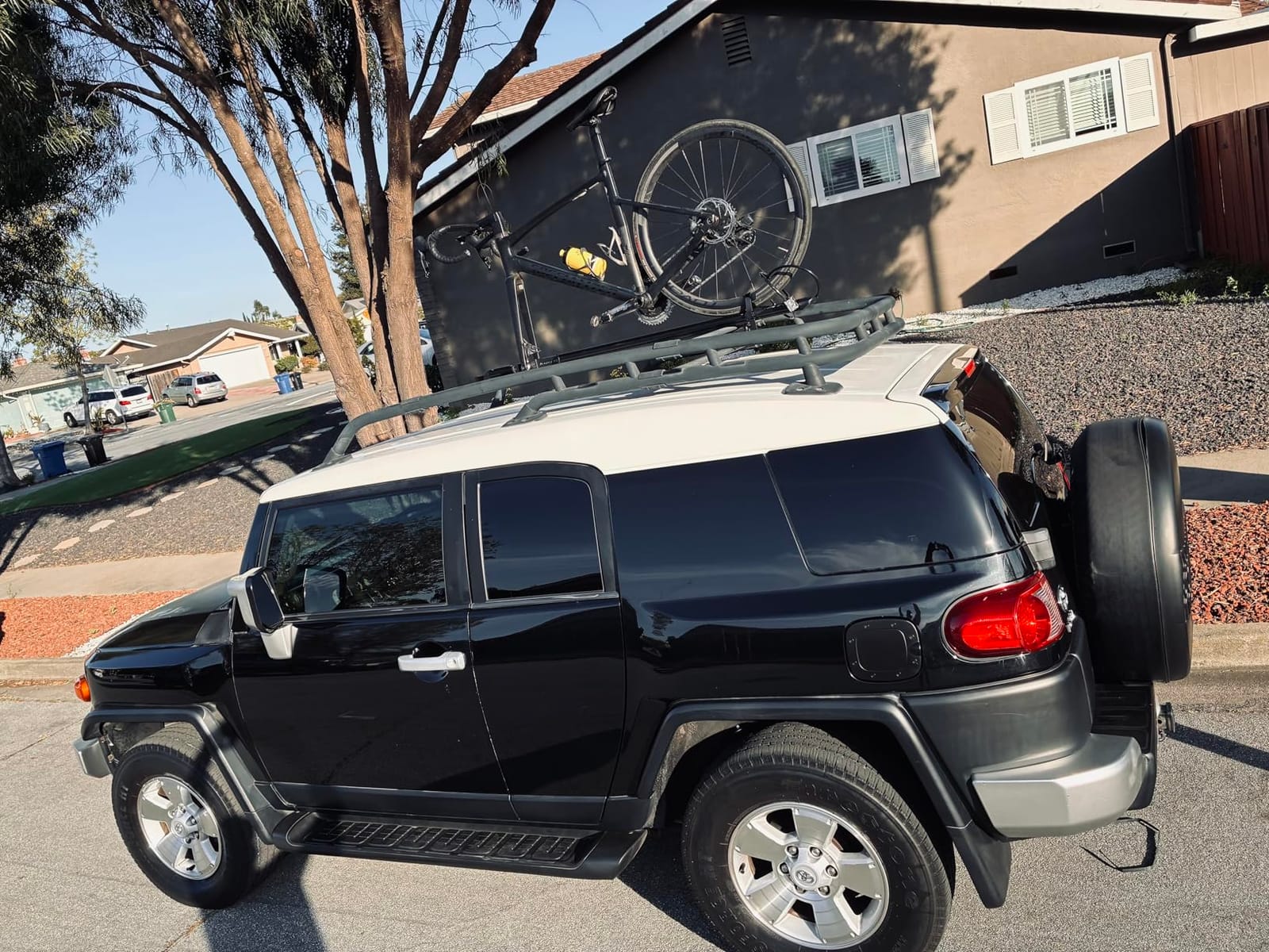 Kuat Trio Fork Mount Carrier, 1 Bike Capacity, Black & Silver | Secure Durable Bike Roof Rack with Integrated Cable Lock & Sliding Rear Tire Strap, Adapters Included customer photo 1
