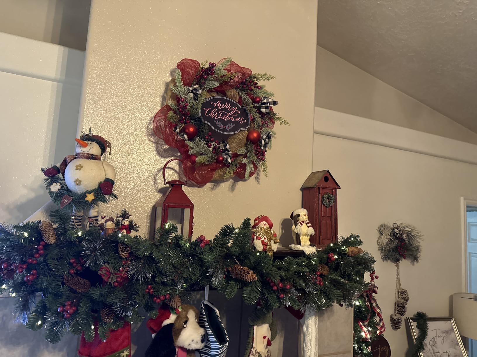 National Tree Company 9ft Pre-Lit Crestwood Spruce Christmas Garland | 50 Warm White LED Lights, 180 Tips, Artificial Christmas Decoration With Glitter, Pinecones, Red Berries, Timer, Green customer photo 2