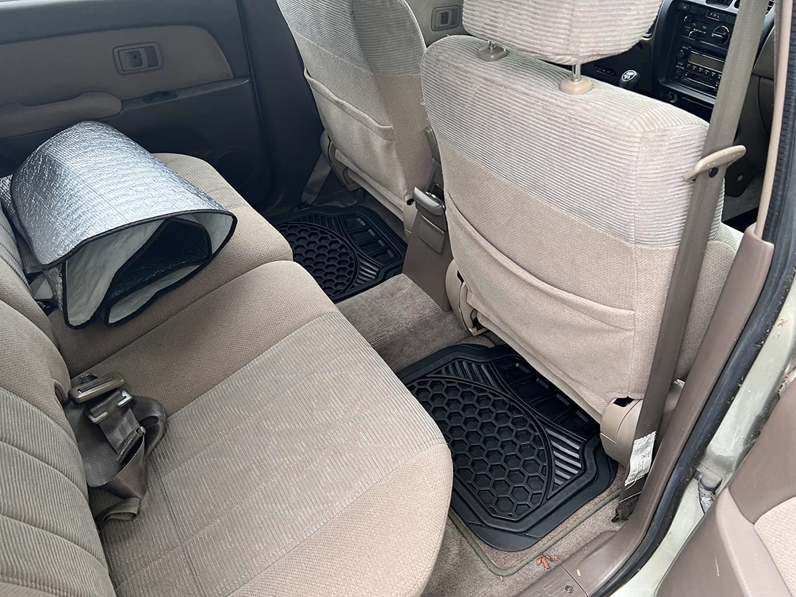 Amazon Basics Heavy Duty Thick PVC Car Floor Mats, Anti-Slip, Easy to Clean, Universal Trim-to-Fit All-Weather for Automotive SUV Sedans Trucks, 4-Piece, Solid Black customer photo 1