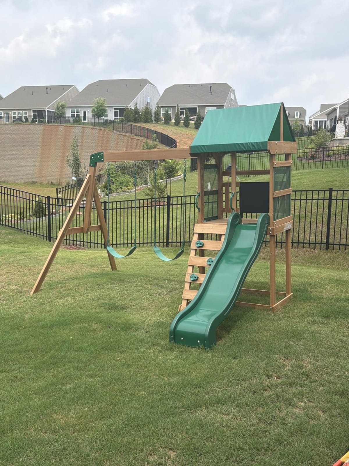 Backyard Discovery Buckley Hill Cedar Wood Swing Set with Wave Slide, Play Deck, Rock Wall Ladder, Belt Swings, Chalkboard, Canopy Roof, Outdoor Playset customer photo 1