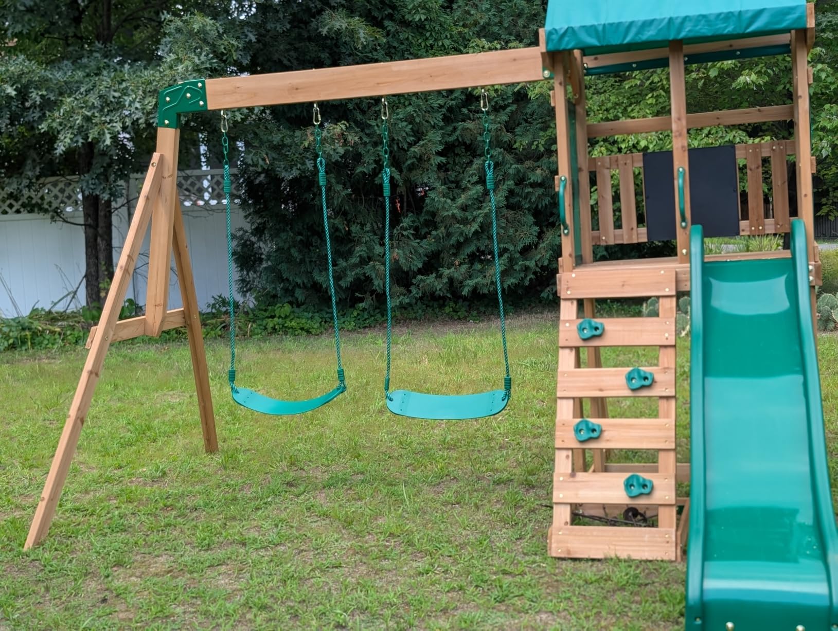 Backyard Discovery Buckley Hill Cedar Wood Swing Set with Wave Slide, Play Deck, Rock Wall Ladder, Belt Swings, Chalkboard, Canopy Roof, Outdoor Playset customer photo 2