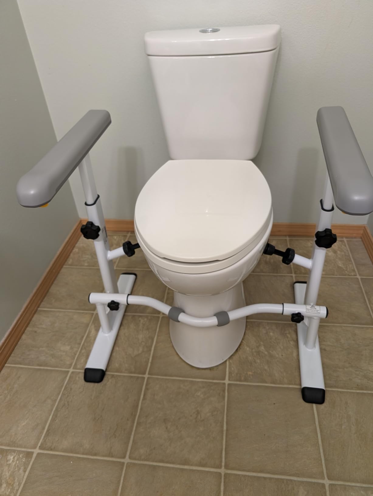 KMINA Toilet Safety Rails for Seniors, Adjustable Frame with Grab Bars | Armrests with 6 Height Settings, Heavy Duty Steel, Lateral Suction Pads, Easy to Install, White customer photo 1