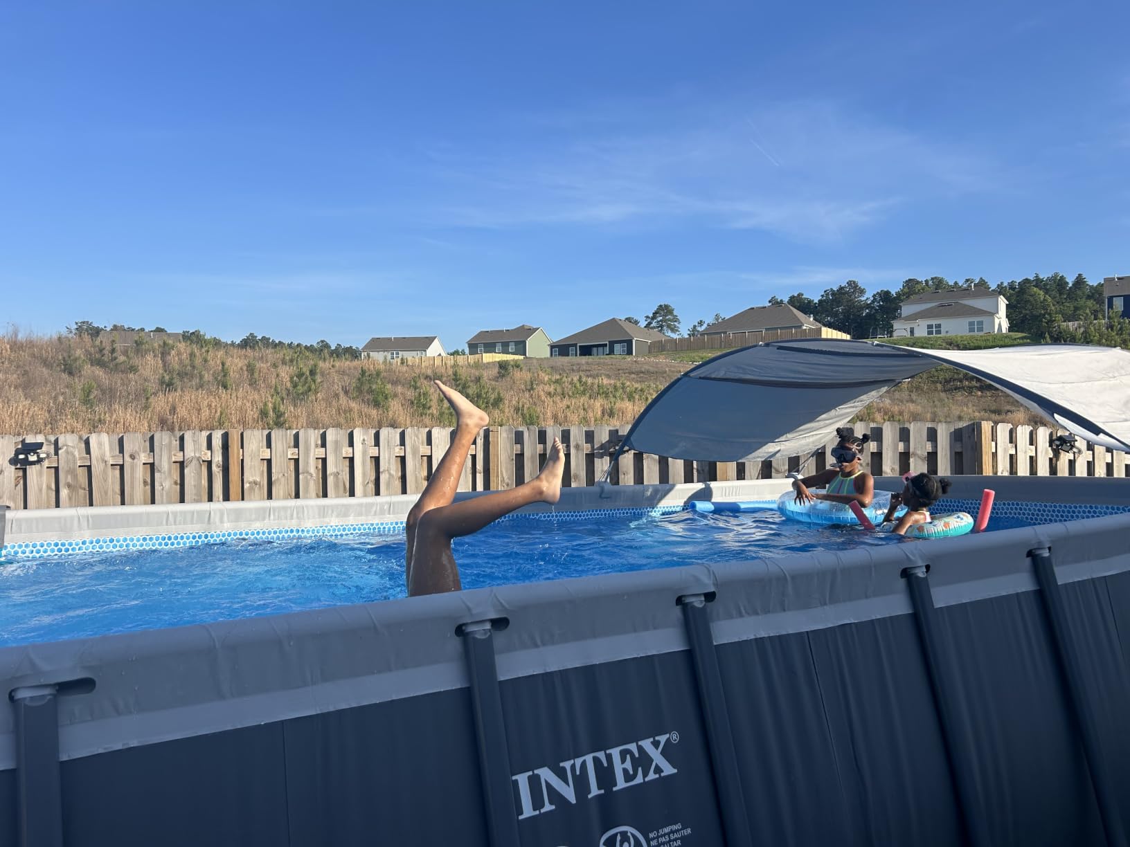 INTEX Ultra XTR 18ft x 9ft x 52in Above Ground Swimming Pool Set Bundle with 1500 GPH Sand Filter Pump, Ladder, Pool Cover & Ground Cloth and Sunshade Canopy customer photo 1