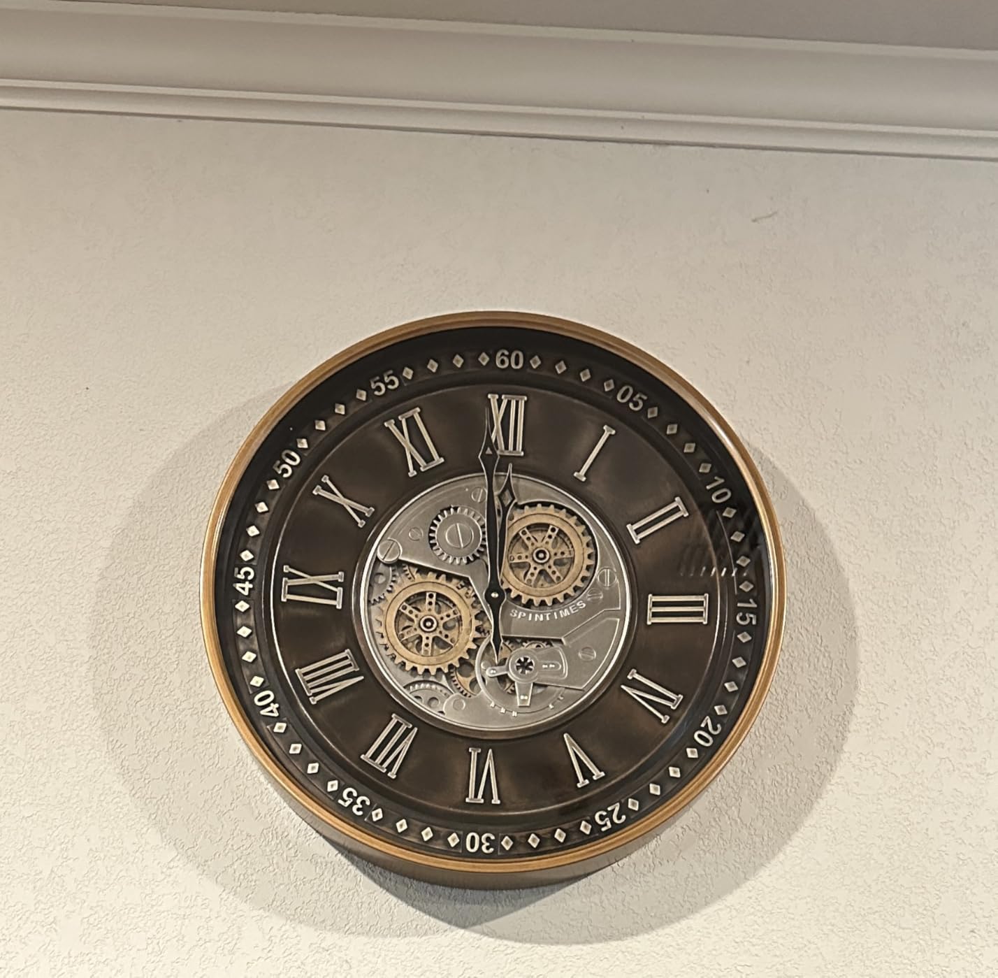 CLXEAST 24 Inch Large Moving Gear Wall Clock for Living Room Decor,Bronze | Durable Metal Case,SIilent Non Ticking, Oversized Industrial Roman Numeral Wall Clocks for Dinning Room & Home Office customer photo 1