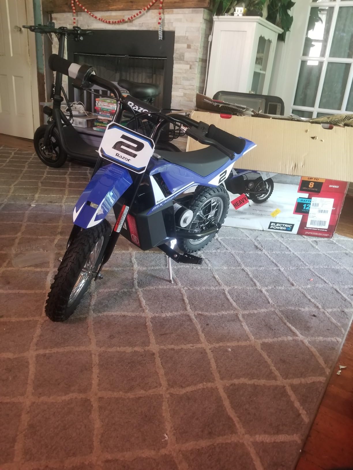 Razor MX125 Dirt Rocket Electric-Powered Bike with Authentic Motocross Geometry, Rear-Wheel Drive, 100-watt, high-Torque, Chain-Driven Motor, for Kids 7+, Blue customer photo 1