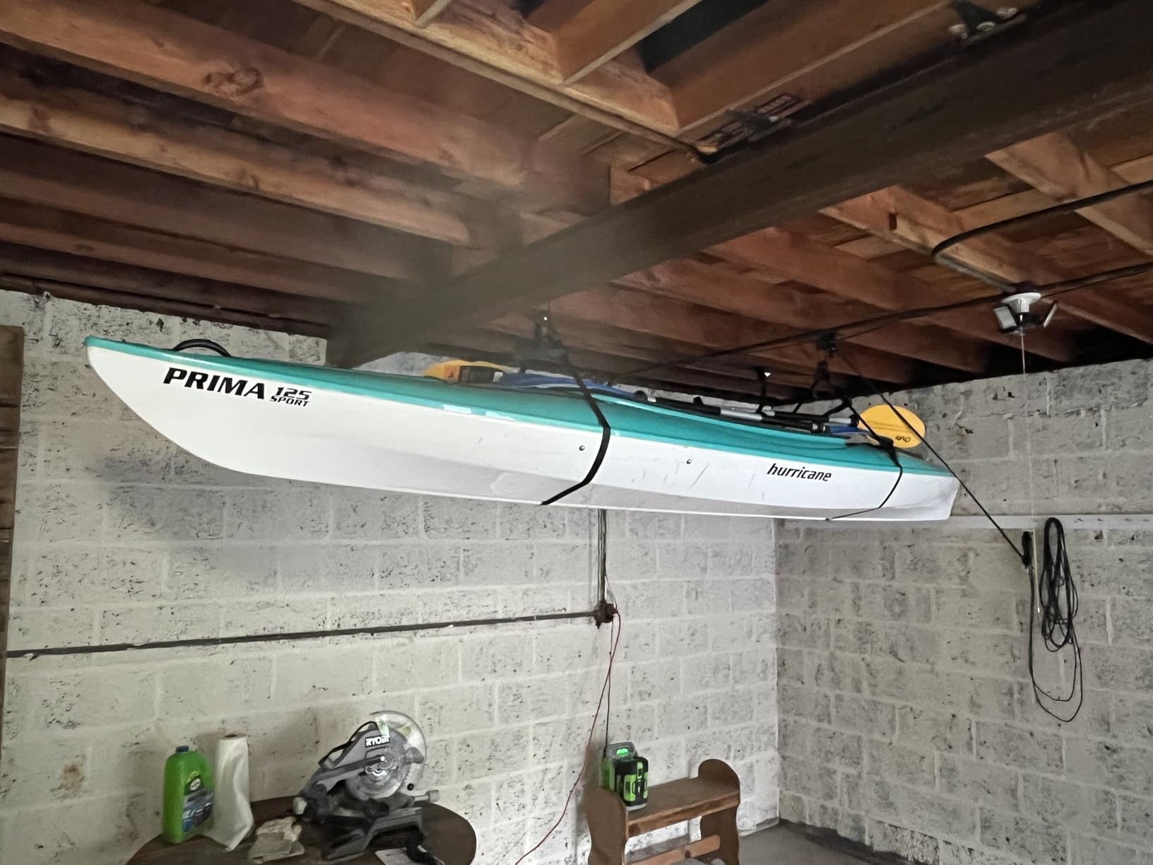 StoreYourBoard Kayak and Canoe Ceiling Hoist - Overhead Garage Storage Rack for Kayaks, Canoes, and Paddle Gear - Heavy Duty Pulley System Indoor Ceiling Mount customer photo 1