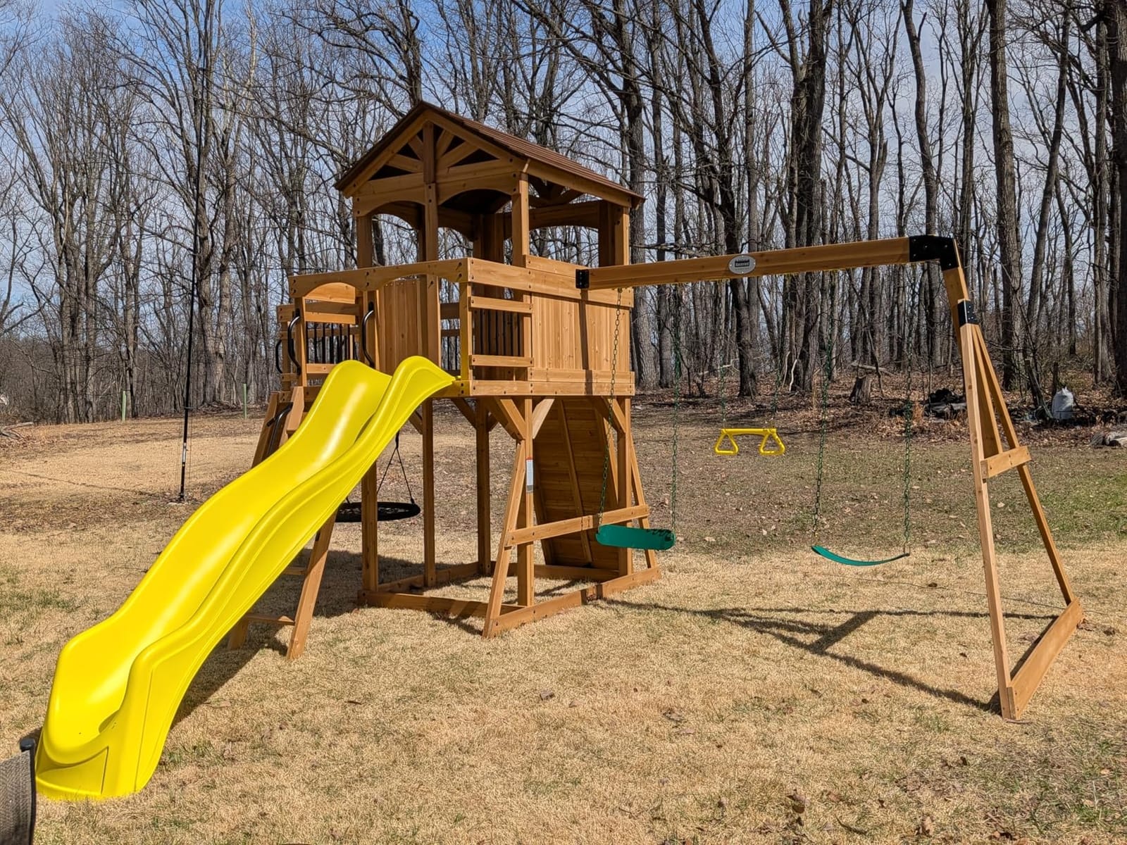 Backyard Discovery Sterling Point Cedar Wood Swing Set with Wave Slide, Raised Clubhouse, Wooden Bridge, Rock Wall, Belt Swings, Web Swing, Trapeze, Balcony, Climbing Wall, Ladder, Outdoor Playset customer photo 2