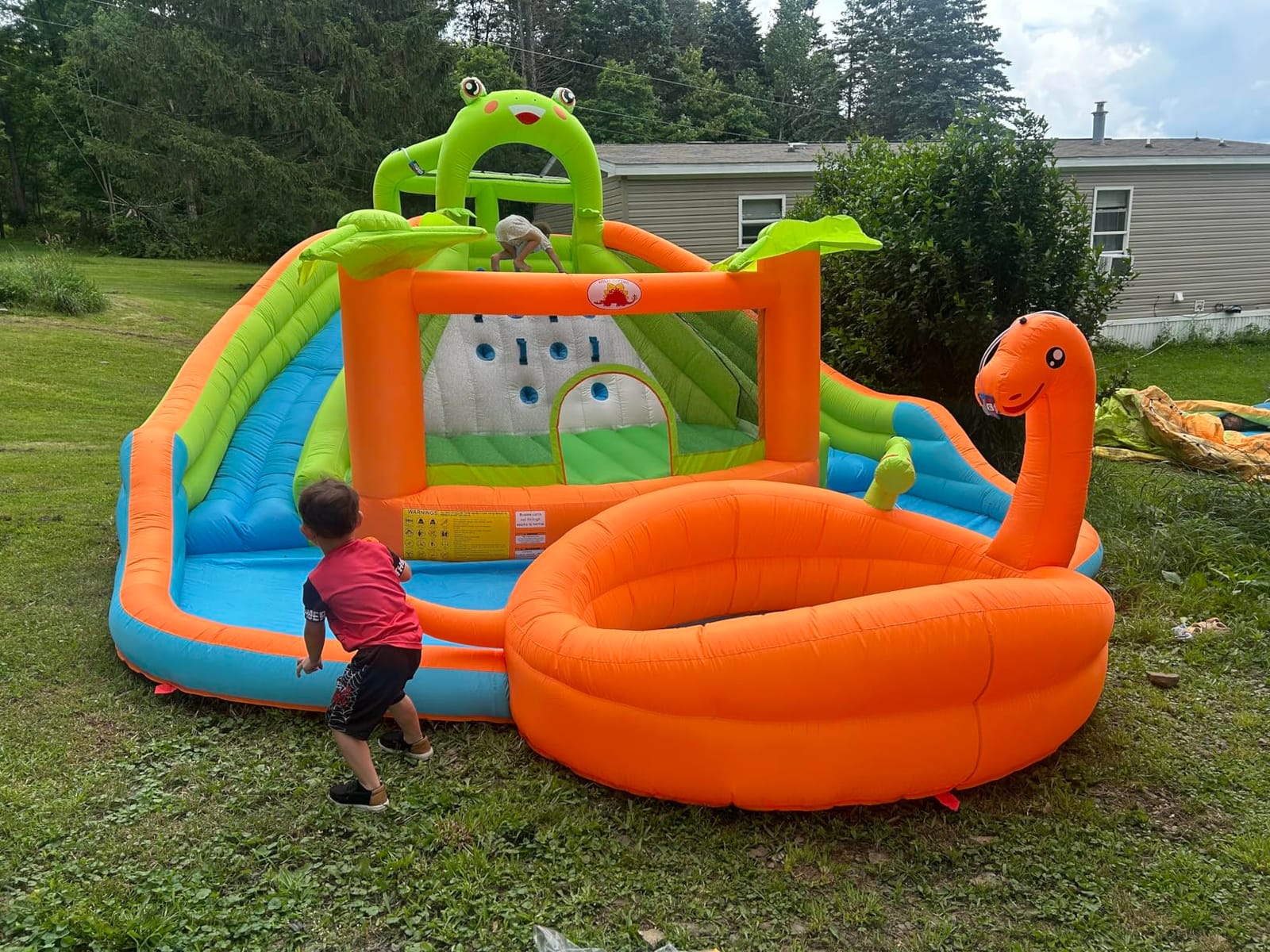 WELLFUNTIME Inflatable Water Double Slides Park with Blower, Bouncy Castle with Water Cannon, Dino Pool, Frog Castle, Climbing Wall, Basketball Hoop, Backyard Water Park for Kids customer photo 1