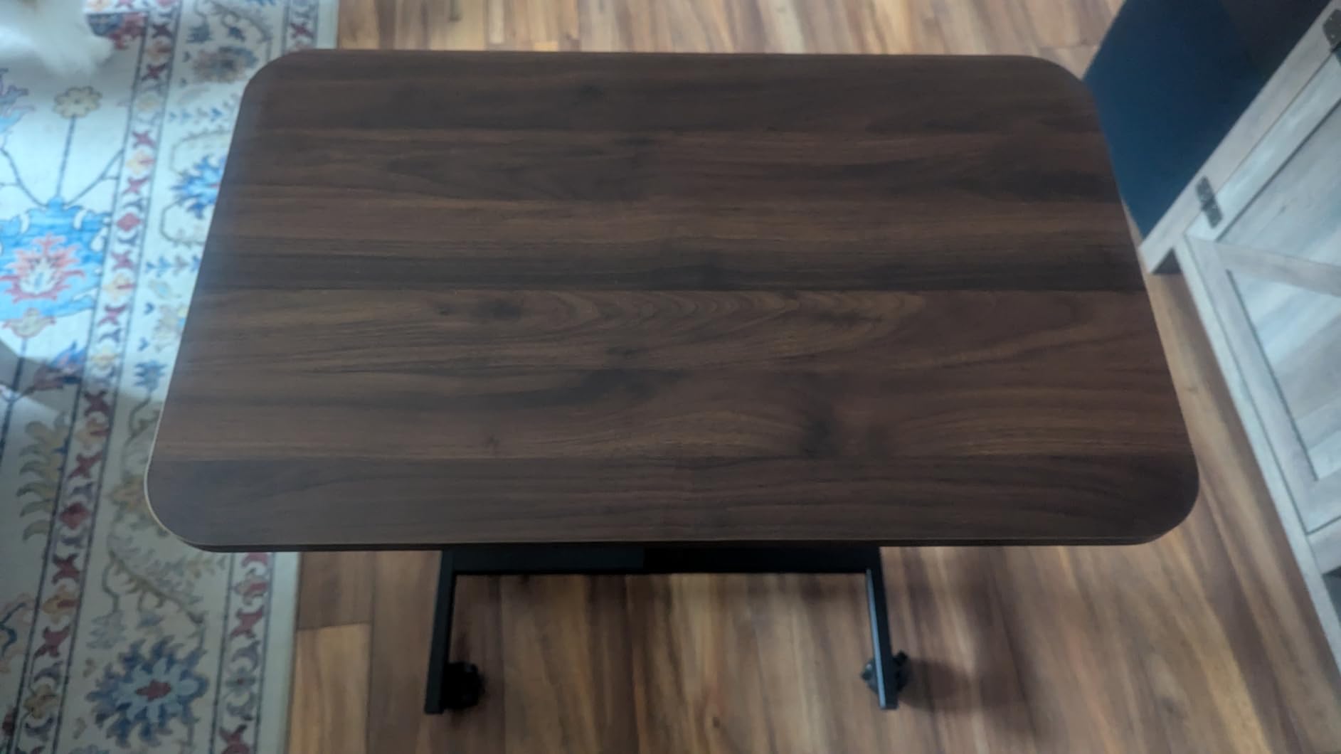 HUANUO Small Rolling Laptop Standing Desk, Height Adjustable Mobile T-Base Desk with Lockable Casters, Portable Sit-Stand Workstation for Bedside & Sofa, Walnut customer photo 1