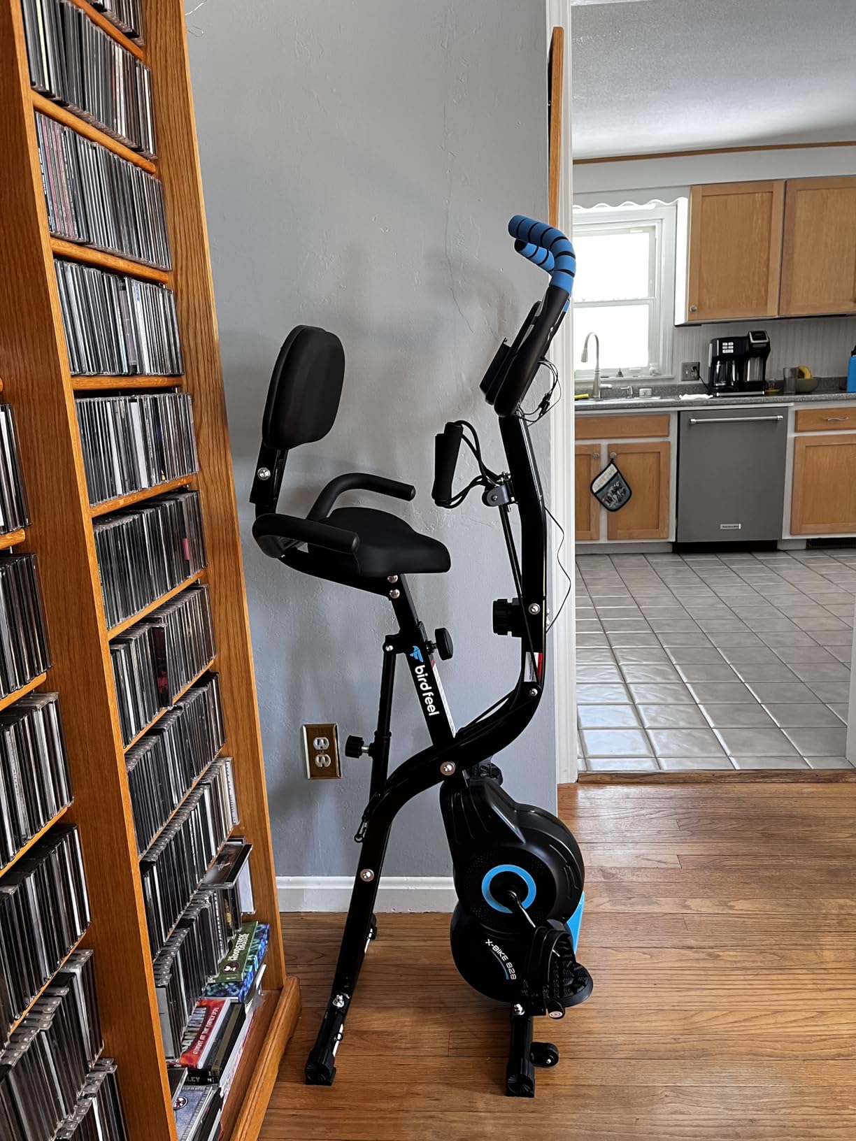 Foldable Exercise Bike, 8-Level Magnetic Stationary Bike for Home Gym | Quiet indoor workout bike with arm resistance bands, LCD monitor, and 300 lbs capacity for full-body cardio training customer photo 1