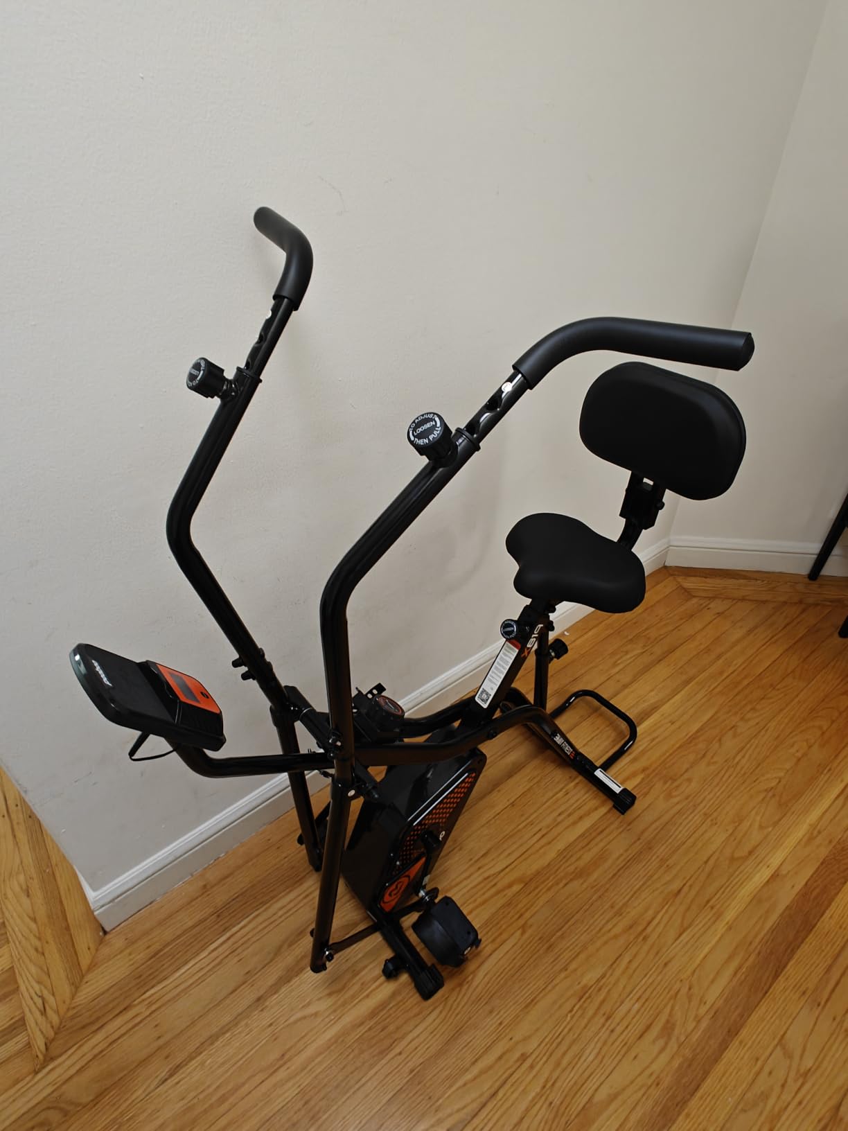 pooboo Folding Magnetic X-Bike, Upright Exercise Bike for Home Gym | Foldable Indoor Stationary Cycling Bike, 8-Level Resistance, 6.6 LBS Flywheel, 300 LB Capacity, Back Support Cushion customer photo 1