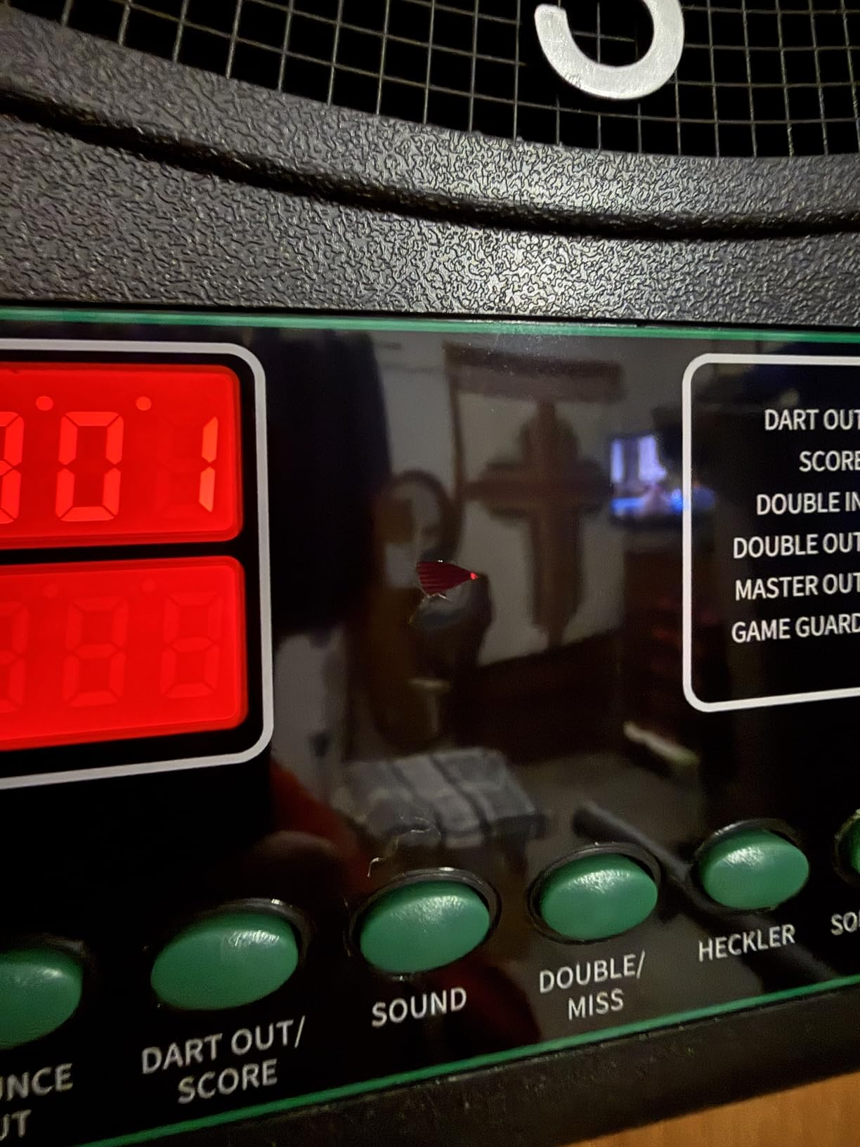Arachnid CricketMaxx 1.0: 13.5” recreation size with wood cabinet. Features 34 games, 183 variations, 8-player LED X/O scoring, and Heckler mode. Integrated storage for darts and accessories customer photo 1
