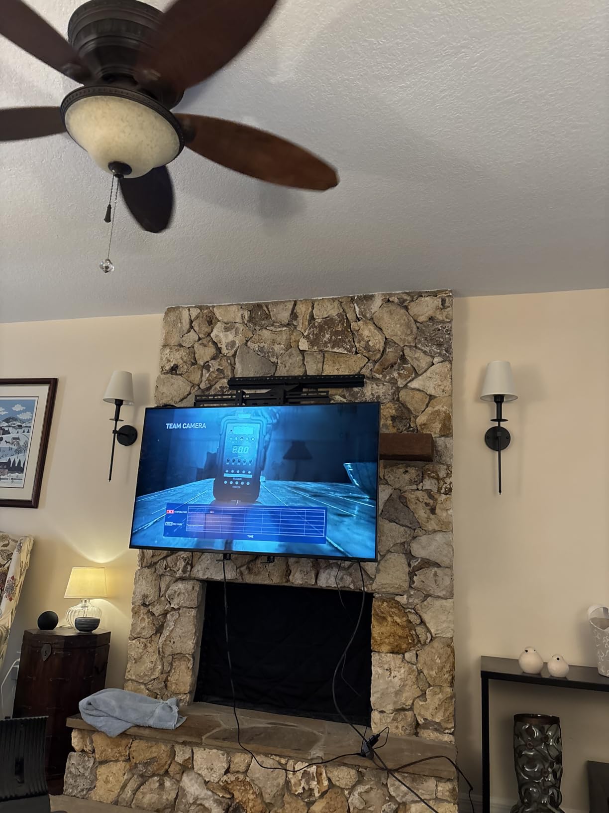 MantelMount MM340 Above Fireplace Pull Down TV Mount - Televisions 44