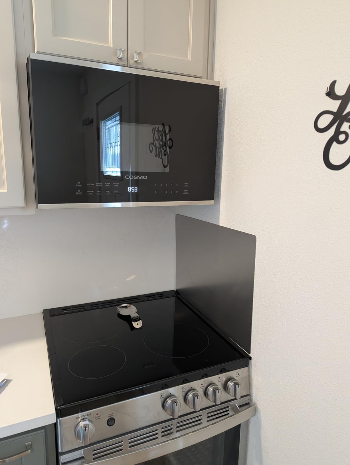 24 in. Stellar Coll 1.3 cu ft Over the Range Microwave, Vent Fan, Stainless | Cosmo COS-2413ORM1SS 1000W, Touch Presets, Black Glass, Sensor Cooking, Automatic Defrost, LED Light, Child Safety Lock customer photo 2