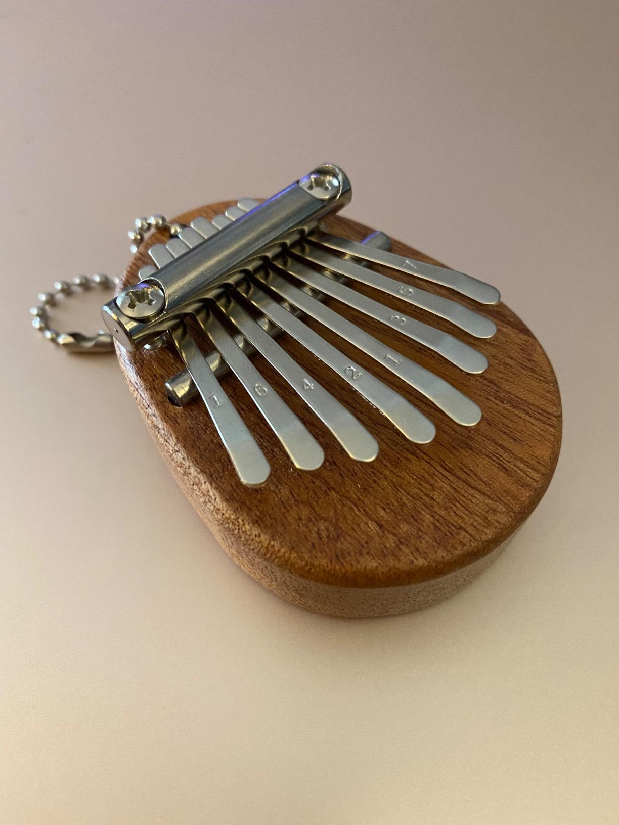 8 Key Mini Kalimba exquisite Finger Thumb Piano Marimba Musical good accessory Pendant Gift customer photo 1