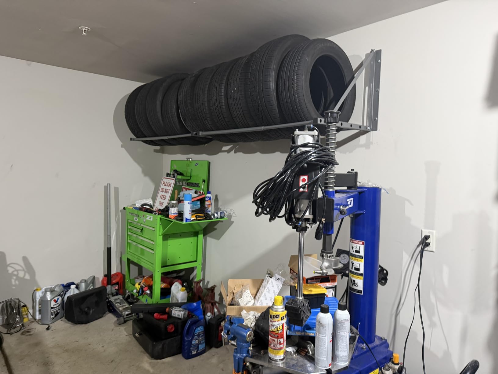 MaxxHaul 50256 Heavy‑Duty Adjustable Wall‑Mount Tire Storage Rack – Telescoping 32–48″ Width, 375 lb Capacity, Powder‑Coated Steel, 51.75″W x 28″D x 28″H – Garage/Shop customer photo 1