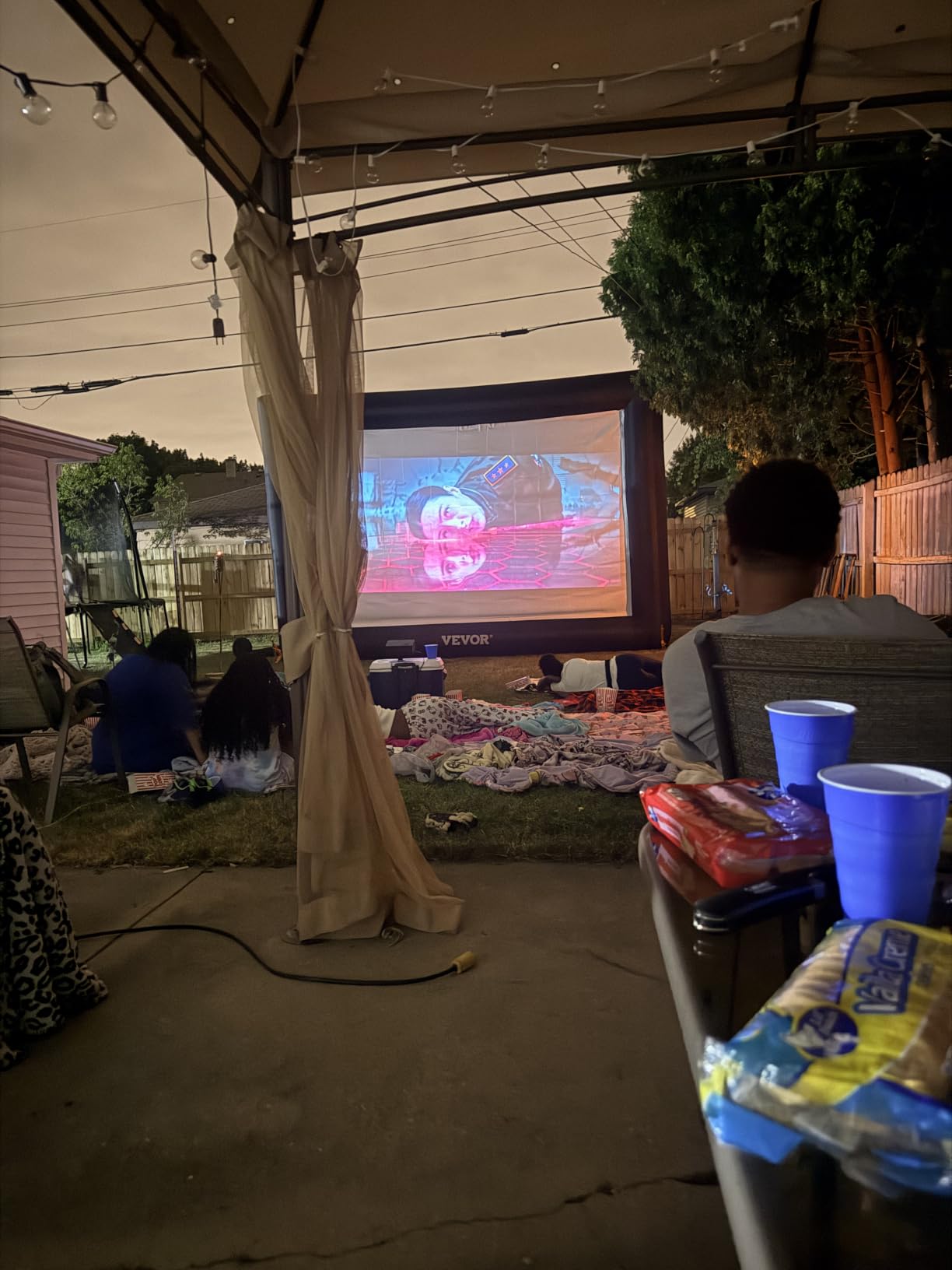 Outdoor Projector with WiFi and Bluetooth & Stand,3000 Brightness,Portable Smart projector with Official Licensed Apps and AI Auto Focus,4K movie projectors Compatible with Netflix/YouTube/PrimeVideo customer photo 2