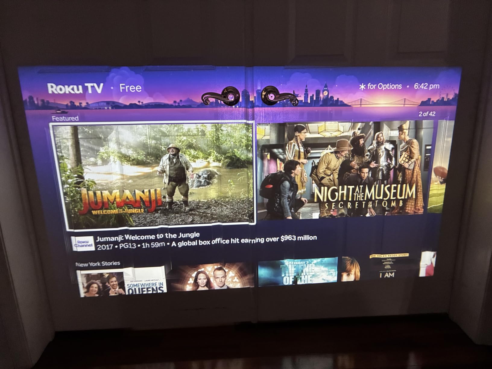 ELEPHAS Roku TV Smart Projector with Wi-Fi and Bluetooth | Built-in Roku TV, Works with Alexa & Google Home, Dolby Audio, Portable Mini Projector for Bedroom, Outdoor customer photo 1