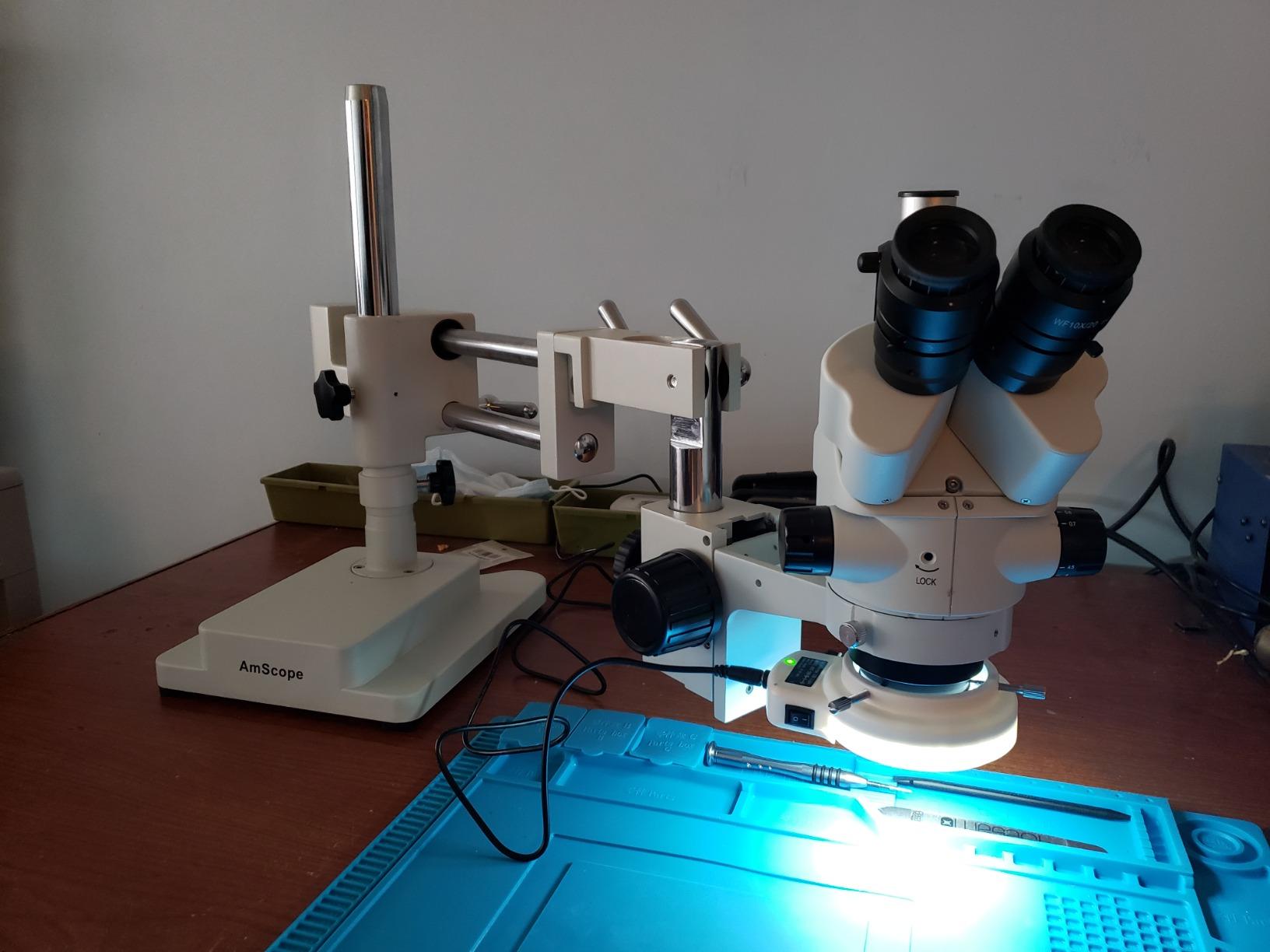 AmScope SM-4NTP 45X Simul-Focal Stereo Lockable Zoom Microscope on Dual customer photo 1